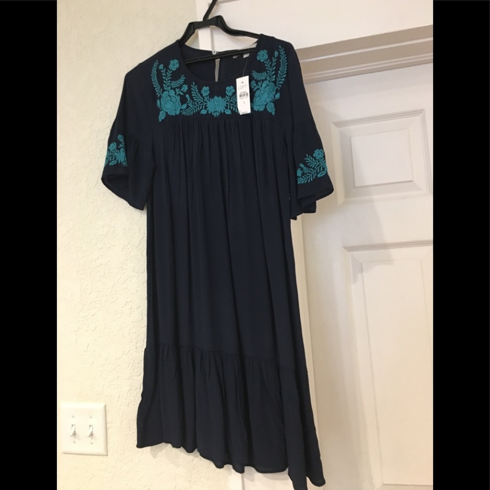Dark blue dress with turquoise stitching